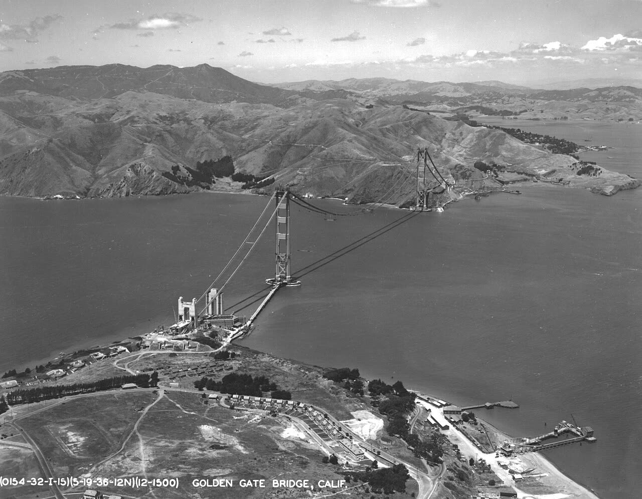 The bridge under construction from the air, May 19, 1936